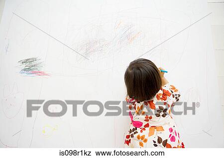Stock Photo - Girl drawing on a wall. Fotosearch