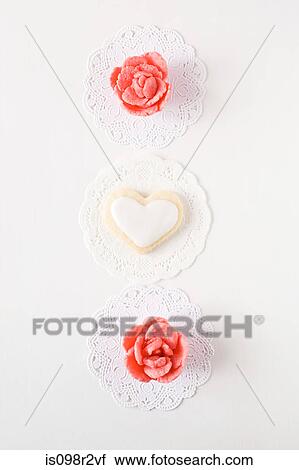 Heart shaped biscuit and sweets View Large Photo Image Stock Image - Heart shaped biscuit and sweets. Fotosearch