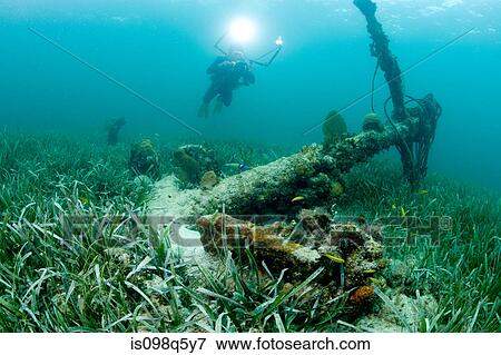 Stock Photo - Large anchor and scuba diver.. Fotosearch