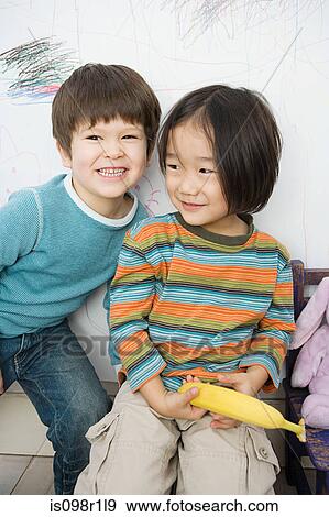 Stock Photo - Portrait of two boys. Fotosearch