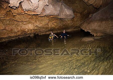 Rafting an underground river. View Large Photo Image Stock Image - Rafting an underground river.. Fotosearch