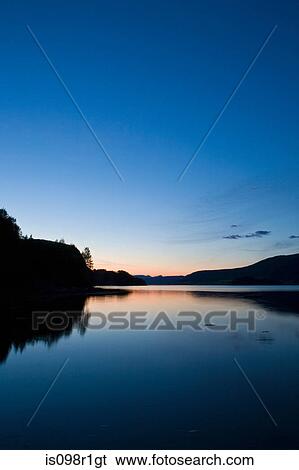 Stock Photograph - Rodvenfjord at sunset. Fotosearch