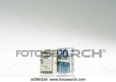 Stock Photo - Rolled up banknotes. Fotosearch
