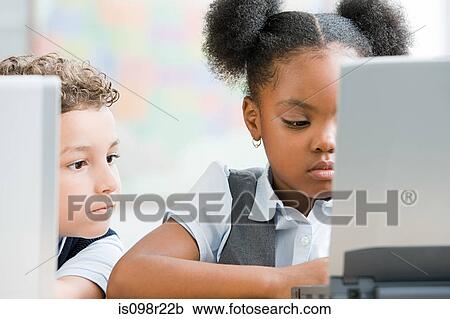 School children with laptop View Large Photo Image Stock Image - School children with laptop. Fotosearch