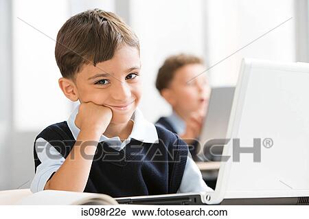 Schoolboy in class View Large Photo Image Stock Image - Schoolboy in class. Fotosearch