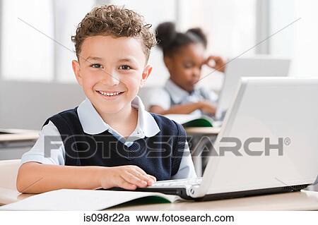 Schoolboy with laptop View Large Photo Image Stock Image - Schoolboy with laptop. Fotosearch