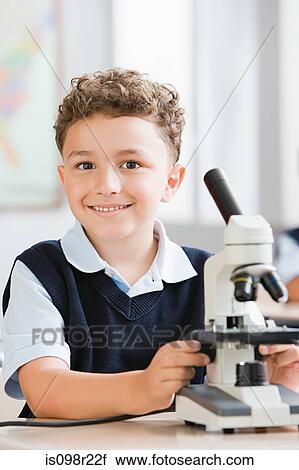 Schoolboy with microscope View Large Photo Image Stock Image - Schoolboy with microscope. Fotosearch