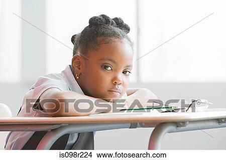 Picture - Schoolgirl in class. Fotosearch