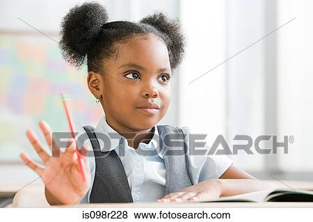 Schoolgirl in class View Large Photo Image Stock Photo - Schoolgirl in class. Fotosearch