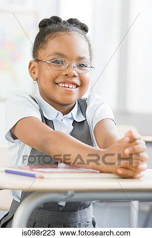 Stock Image - Schoolgirl smiling. Fotosearch
