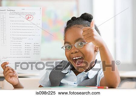 Stock Photography - Schoolgirl with top grade. Fotosearch