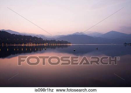 Sunset over lake orta View Large Photo Image Stock Photo - Sunset over lake orta. Fotosearch