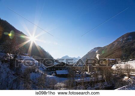 Picture - View over snow covered valley in flachau. Fotosearch
