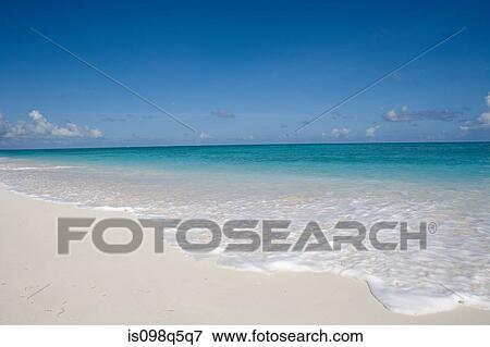 Waves on sandy beach. View Large Photo Image Stock Photo - Waves on sandy beach.. Fotosearch