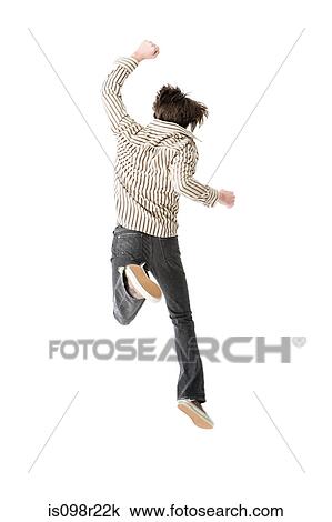 Young man jumping View Large Photo Image Stock Image - Young man jumping. Fotosearch