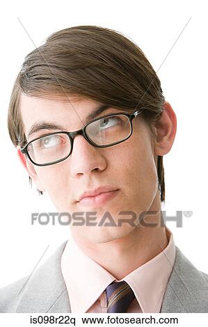 Stock Photography - Young man wearing glasses. Fotosearch