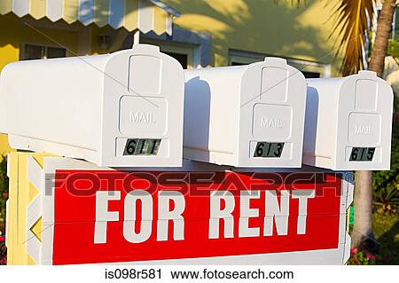 Mailboxes and for rent sign View Large Photo Image Stock Image - Mailboxes and for rent sign. Fotosearch