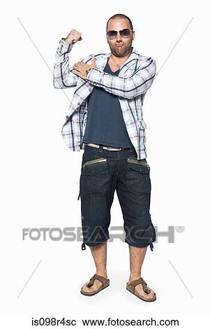Man flexing muscles View Large Photo Image Stock Image - Man flexing muscles. Fotosearch