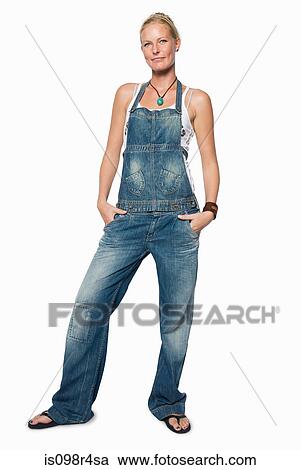 Woman in dungarees View Large Photo Image Stock Image - Woman in dungarees. Fotosearch