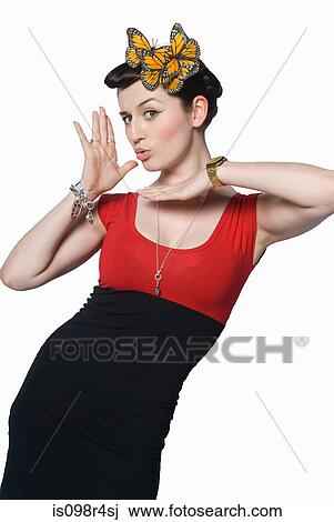 Stock Image - Woman with butterfly headdress. Fotosearch