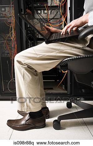 A male computer technicians legs View Large Photo Image Stock Photography - A male computer technicians legs. Fotosearch