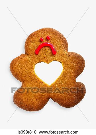 Gingerbread man with missing heart View Large Photo Image Stock Image - Gingerbread man with missing heart. Fotosearch