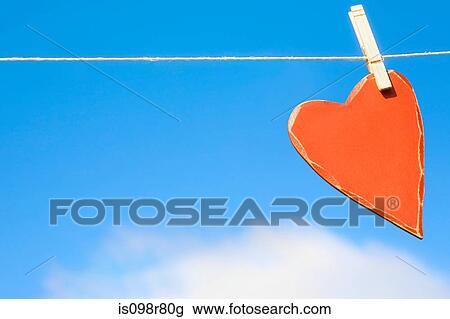 Heart on a washing line View Large Photo Image Stock Image - Heart on a washing line. Fotosearch