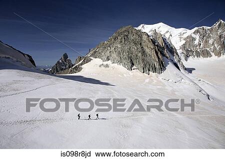 Hikers in french alps View Large Photo Image Stock Image - Hikers in french alps. Fotosearch