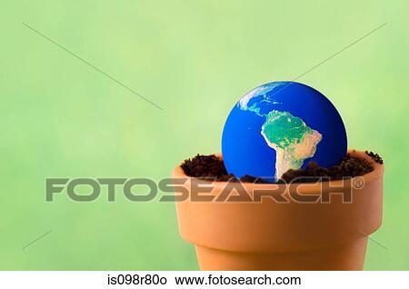 Picture - Planet earth in a flower pot. Fotosearch