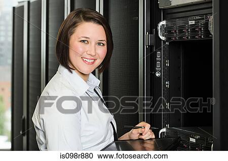 Portrait of a female computer technician View Large Photo Image Stock Image - Portrait of a female computer technician. Fotosearch