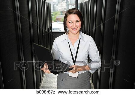 Stock Photo - Portrait of a female computer technician. Fotosearch