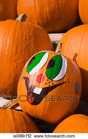 Pumpkin with painted face View Large Photo Image Stock Image - Pumpkin with painted face. Fotosearch