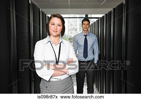 Two young computer technicians View Large Photo Image Stock Photo - Two young computer technicians. Fotosearch