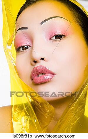 Young woman with plastic around her head View Large Photo Image Stock Photography - Young woman with plastic around her head. Fotosearch