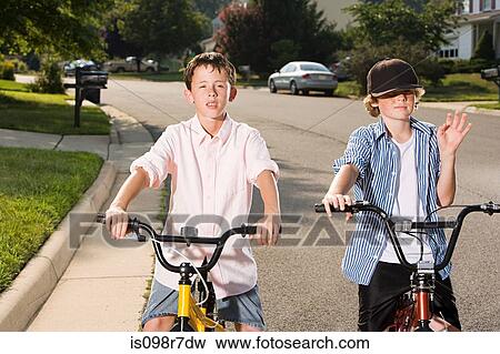Boys with bicycles View Large Photo Image Stock Photo - Boys with bicycles. Fotosearch