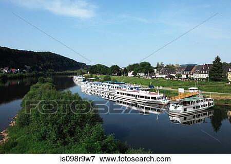 Stock Photo - Tour boats moored on the rhine. Fotosearch