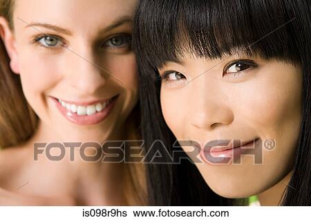 Stock Photograph - Two young women. Fotosearch