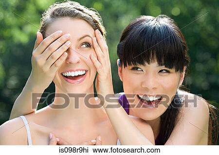 Young women having fun View Large Photo Image Stock Image - Young women having fun. Fotosearch