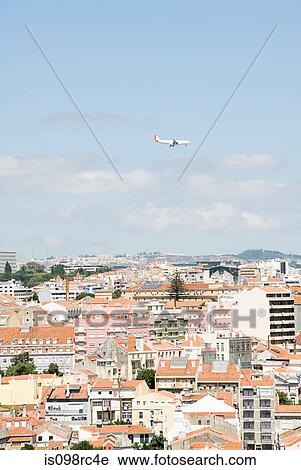 Airplane above lisbon View Large Photo Image Stock Image - Airplane above lisbon. Fotosearch