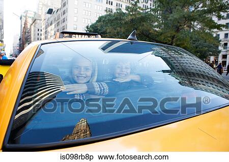 Boy and girl in taxicab View Large Photo Image Stock Photography - Boy and girl in taxicab. Fotosearch