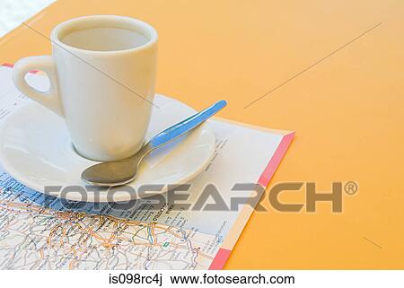 Stock Image - Coffee cup and map. Fotosearch