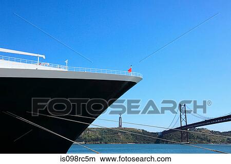 Cruise ship and 25th april bridge View Large Photo Image Picture - Cruise ship and 25th april bridge. Fotosearch
