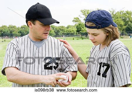 Father and son with baseball View Large Photo Image Stock Photo - Father and son with baseball. Fotosearch