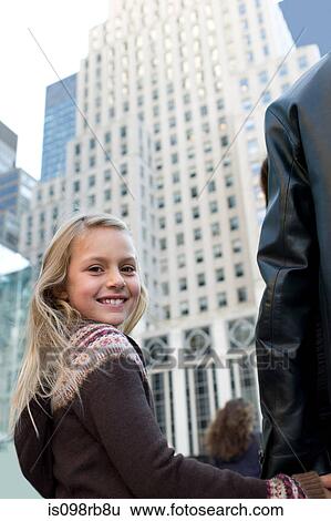 Girl by skyscraper View Large Photo Image Stock Photograph - Girl by skyscraper. Fotosearch