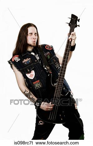 Heavy metal bass player View Large Photo Image Stock Photograph - Heavy metal bass player. Fotosearch