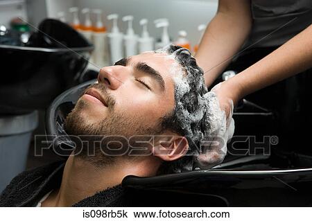 Man having his hair shampooed View Large Photo Image Stock Image - Man having his hair shampooed. Fotosearch