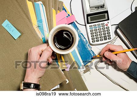 Person with coffee and files View Large Photo Image Stock Photo - Person with coffee and files. Fotosearch