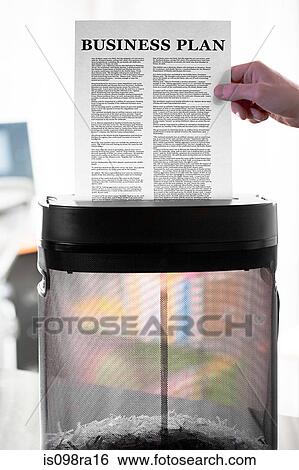 Stock Photograph - Shredding business plan. Fotosearch