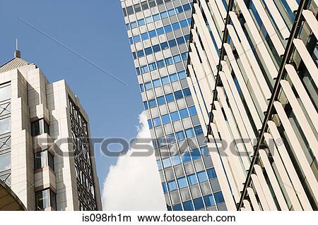 Low angle view of office buildings View Large Photo Image Picture - Low angle view of office buildings. Fotosearch