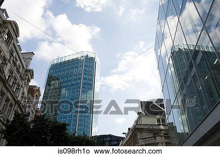 Low angle view of office buildings View Large Photo Image Picture - Low angle view of office buildings. Fotosearch